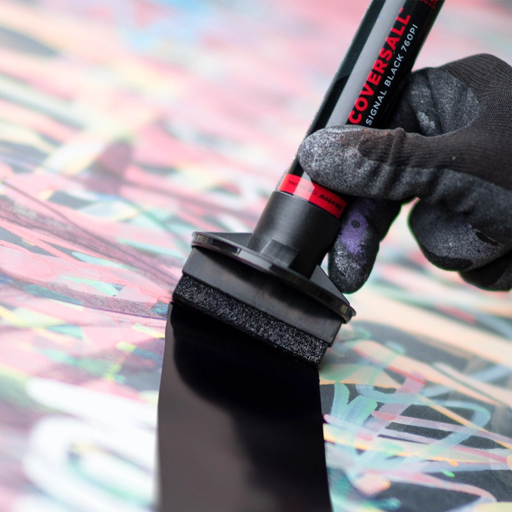 COVERSALL ACTION MARKER